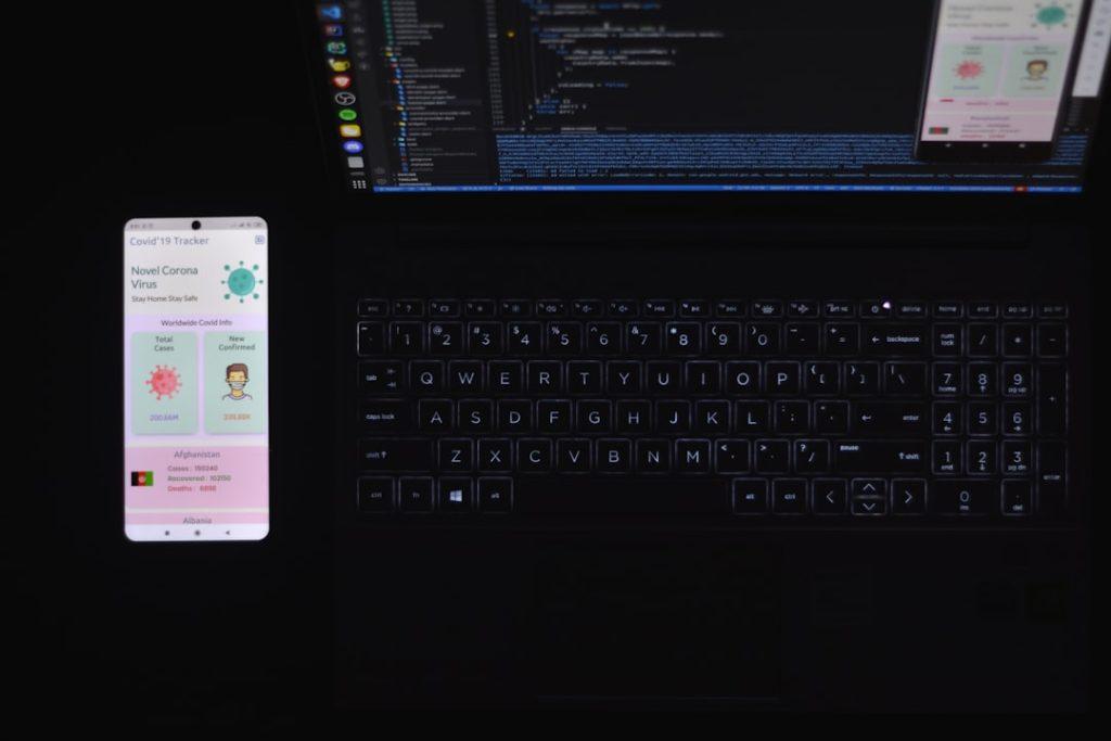 Developers building a Flutter mobile app on laptops