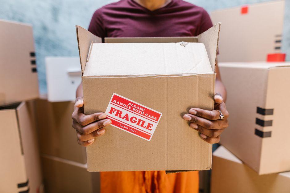Professional movers packing a home for house shifting charges in Hyderabad