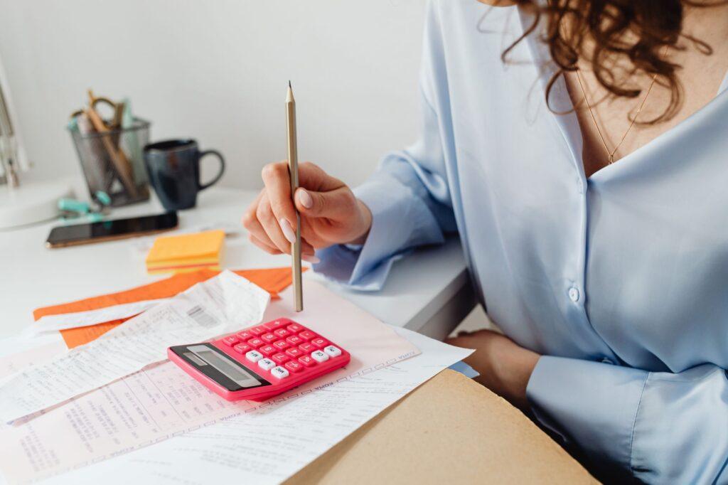 Small business owner reviewing GST accounts in a Delhi office